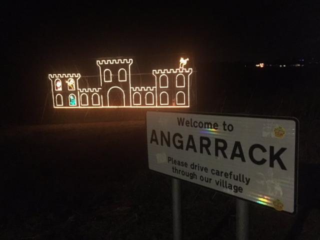 Eleven Pipers Piping and village sign...